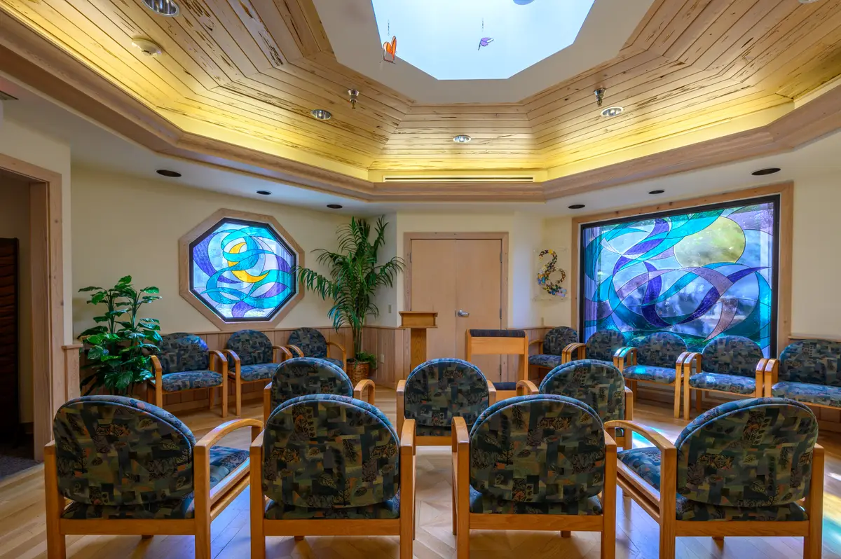 Chapel with stained glass windows and a skylight
