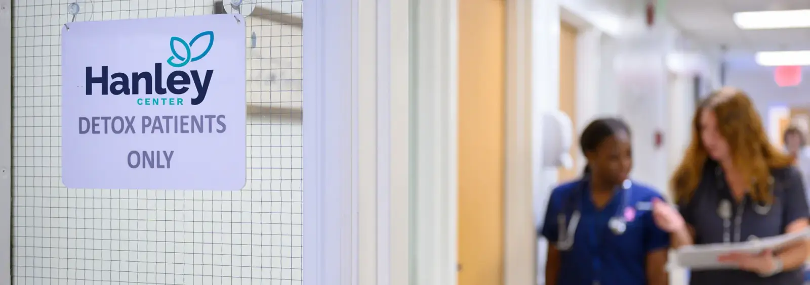 Nurses walking the hallway of the Hanley Center detox unit